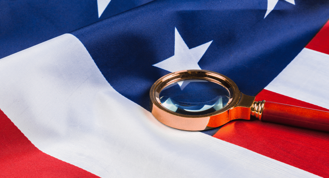 Representação visual do Pix na Mira dos Estados Unidos: Entenda a Suposta Prática Desleal, com os logotipos do Pix e da bandeira dos EUA, e setas de questionamento.