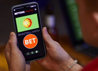 Alerta 2025: Receita Federal Intensifica Fiscalização sobre Apostas Online e Airbnb Uma lupa fiscalizando ícones que representam apostas online e casas com o logo do Airbnb, simbolizando a Fiscalização da Receita Federal em Bets e Airbnb para 2025.